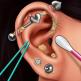 تحميل تطبيق Ear Piercing & Tattoo Games للايفون